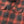 Load image into Gallery viewer, Red and black plaid shirt with a colorful pencil in the pocket
