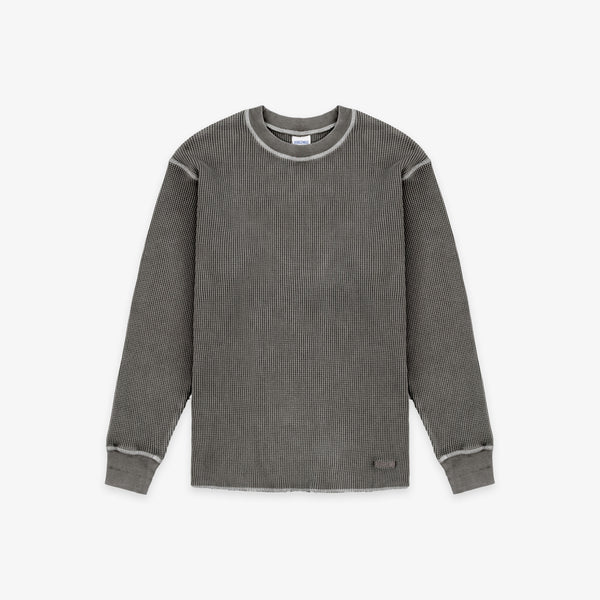A dark gray ribbed knit long-sleeve shirt with contrasting light gray trim around the crew neck, sleeve seams, and cuffs, shown flat on a light gray background.