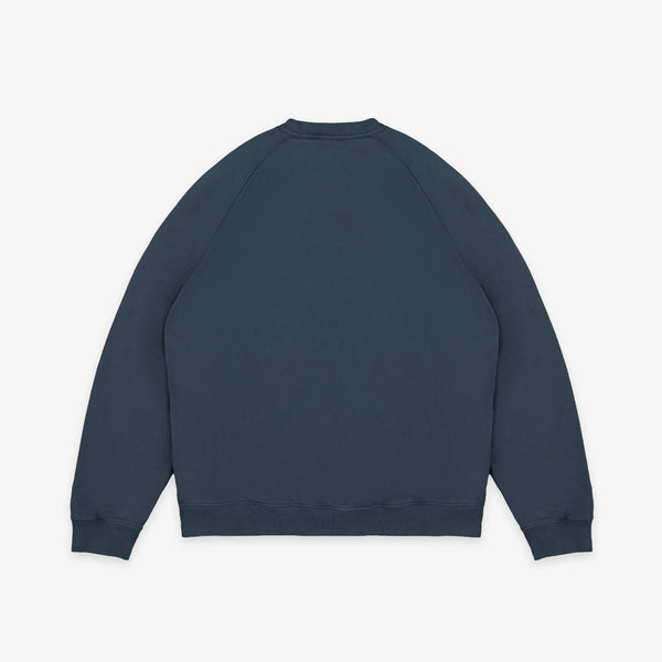 A dark navy blue crewneck sweatshirt shown from the back, laid flat against a light gray background.