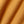Load image into Gallery viewer, A close-up of textured, fuzzy fabric in a warm mustard yellow or golden ochre color, draped in soft diagonal folds.
