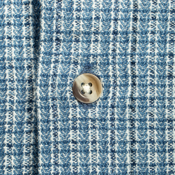 A light blue and white checkered long-sleeve button-down shirt with mother of pearl buttons.