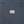 Load image into Gallery viewer, Close-up of a blue canvas work shirt pocket with two metal snap buttons and a white Dubbleware brand label stitched in the center.
