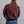 Load image into Gallery viewer, A man viewed from behind wearing a red, yellow, and dark blue plaid fleece jacket and blue jeans against a plain gray studio background.
