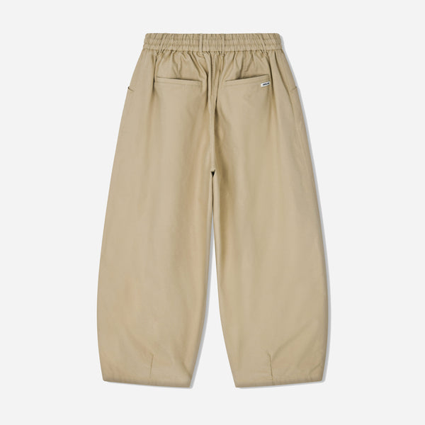 UNBALANCE LONG TUCK BALLOON PANT - BEIGE