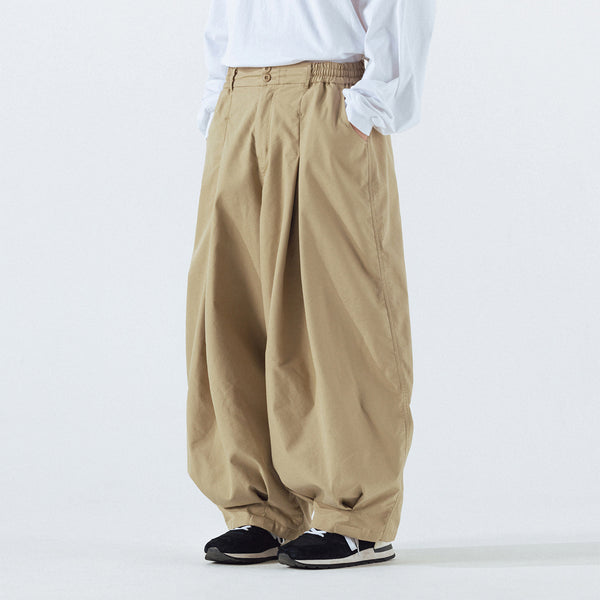 UNBALANCE LONG TUCK BALLOON PANT - BEIGE
